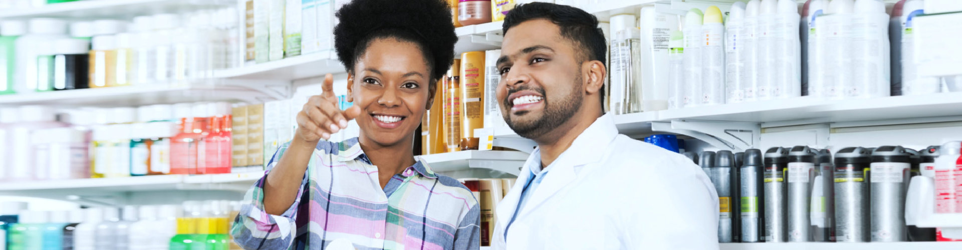 woman and a pharmacist looking at something